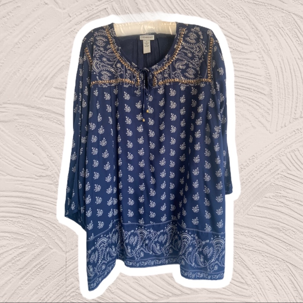 Catherine’s v-neck peasant sleeve top.